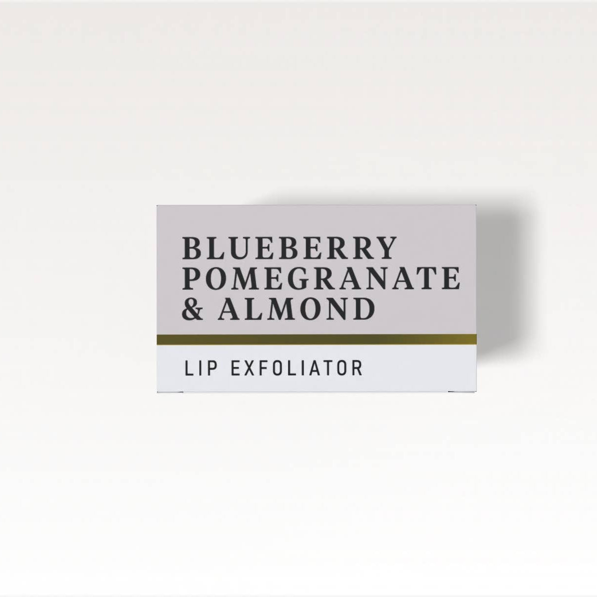 Lip exfoliator packaging with 'Blueberry Pomegranate & Almond' text on a white background