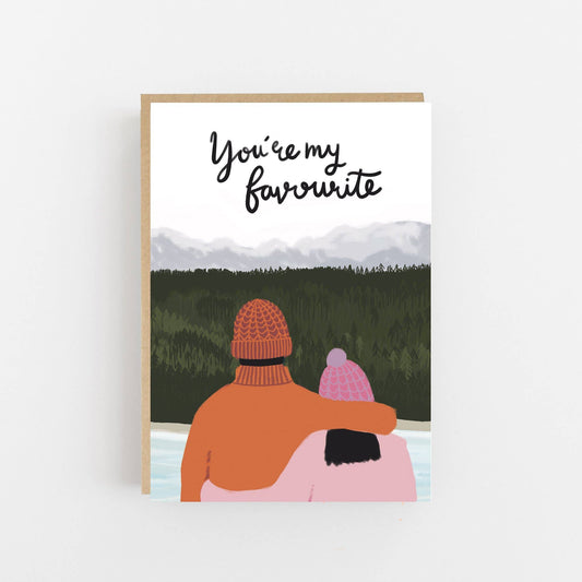 Poster with illustration of two people hugging and text 'You're my favourite' against a mountain backdrop.