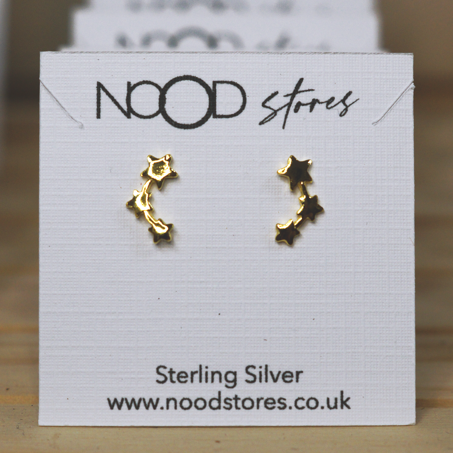Curved Star Studs - Gold