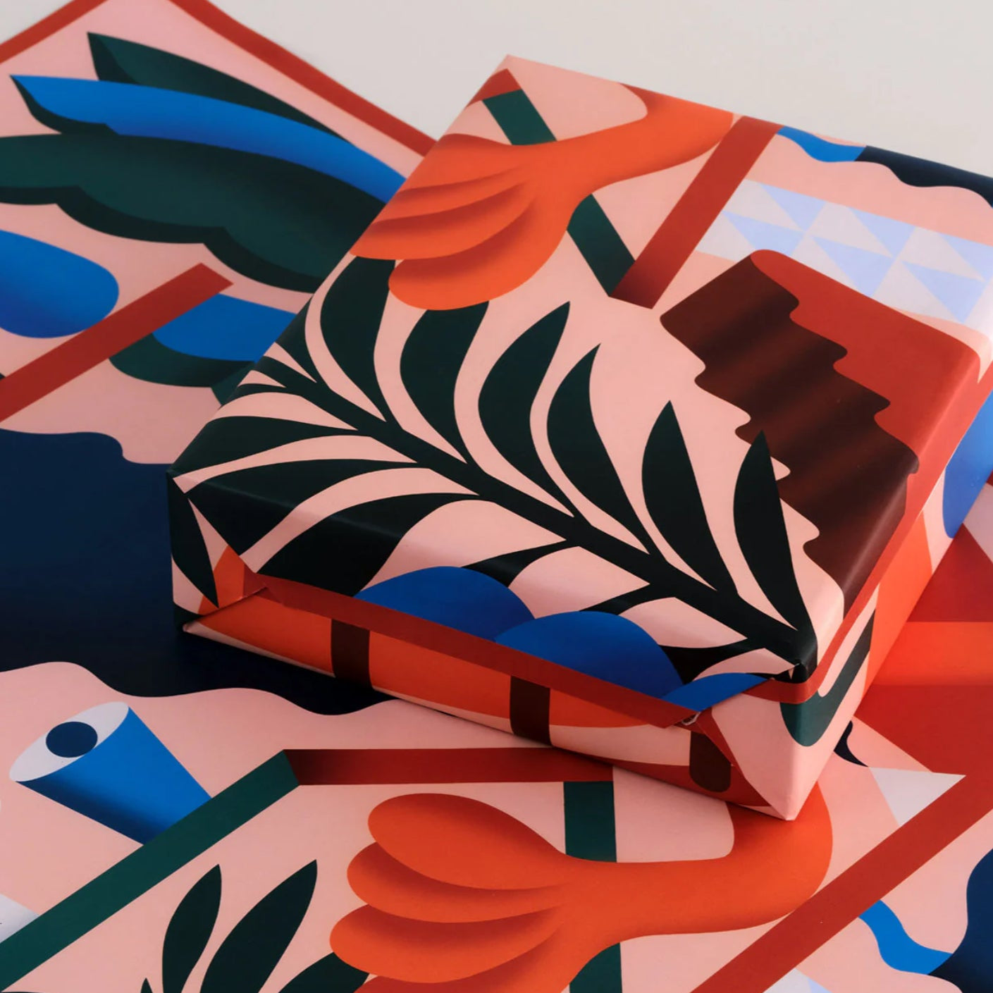 Colorful packaging with abstract design on a white background