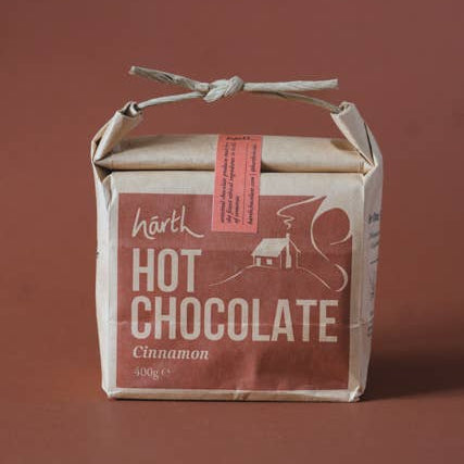 Box of Harth Hot Chocolate Cinnamon on a brown background
