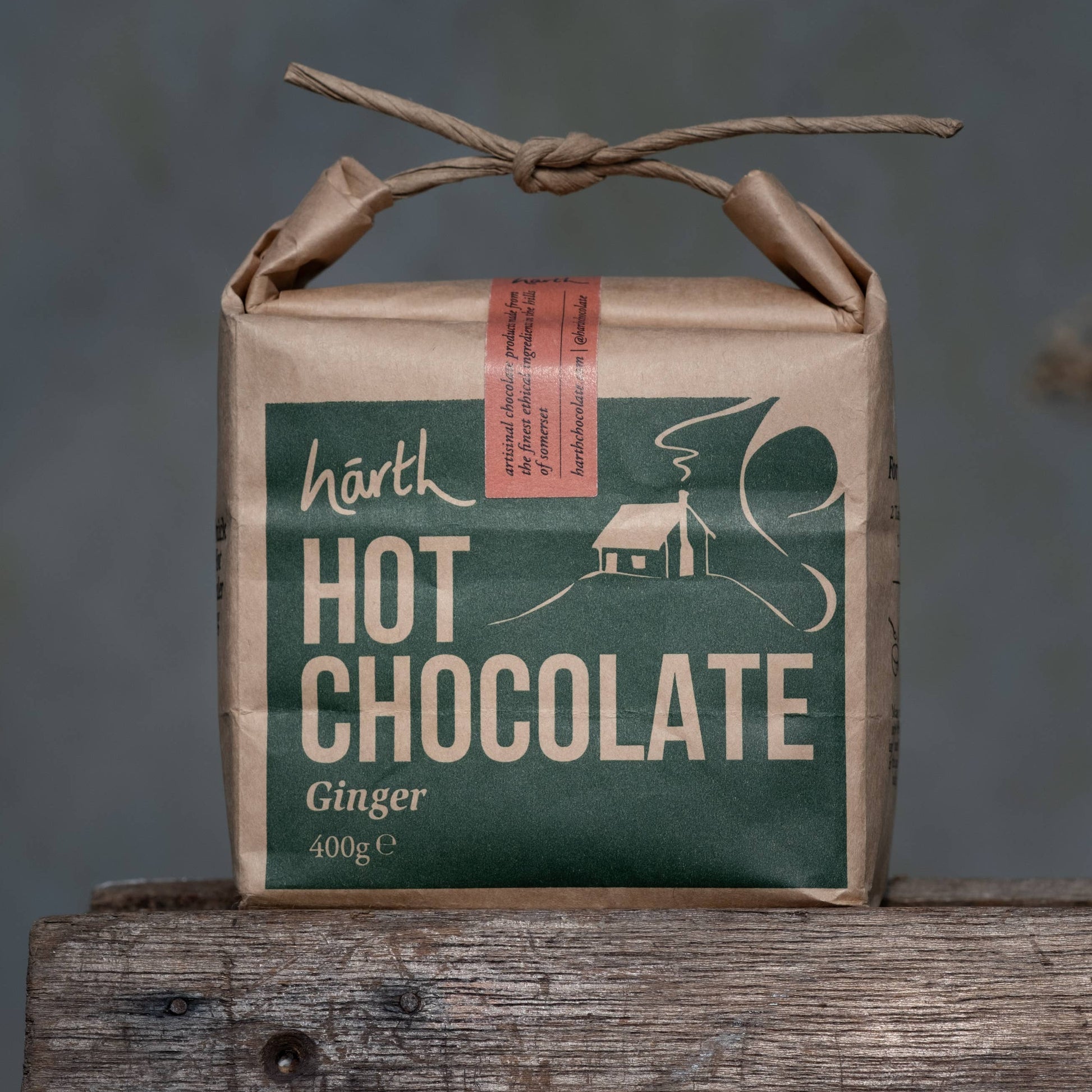 Box of Harth Hot Chocolate Ginger on a wooden surface with a blurred background