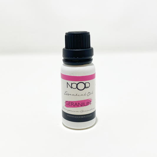 A bottle of NOOD brand Geranium essential oil with a dropper, on a white background.