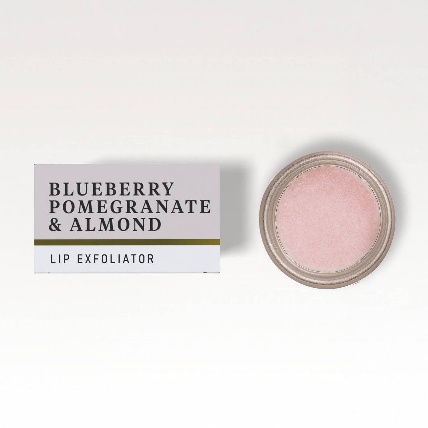 Lip exfoliator with packaging labeled 'Blueberry Pomegranate & Almond' on a white background