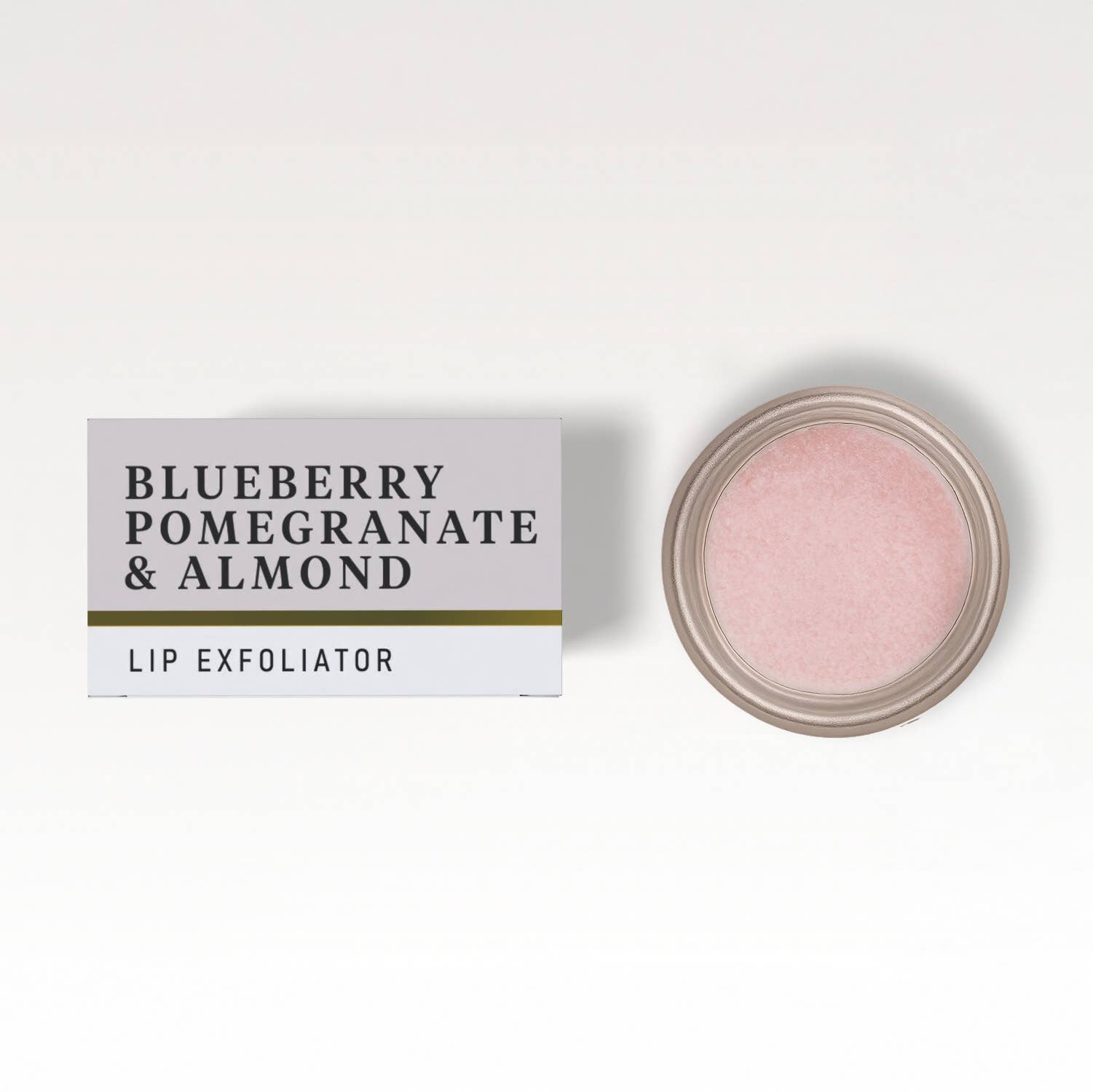Lip exfoliator with packaging labeled 'Blueberry Pomegranate & Almond' on a white background