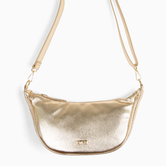 Gold metallic handbag with a strap on a white background
