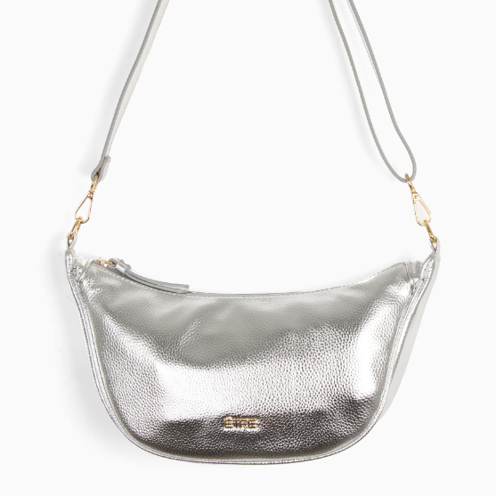Silver metallic handbag with a strap on a white background