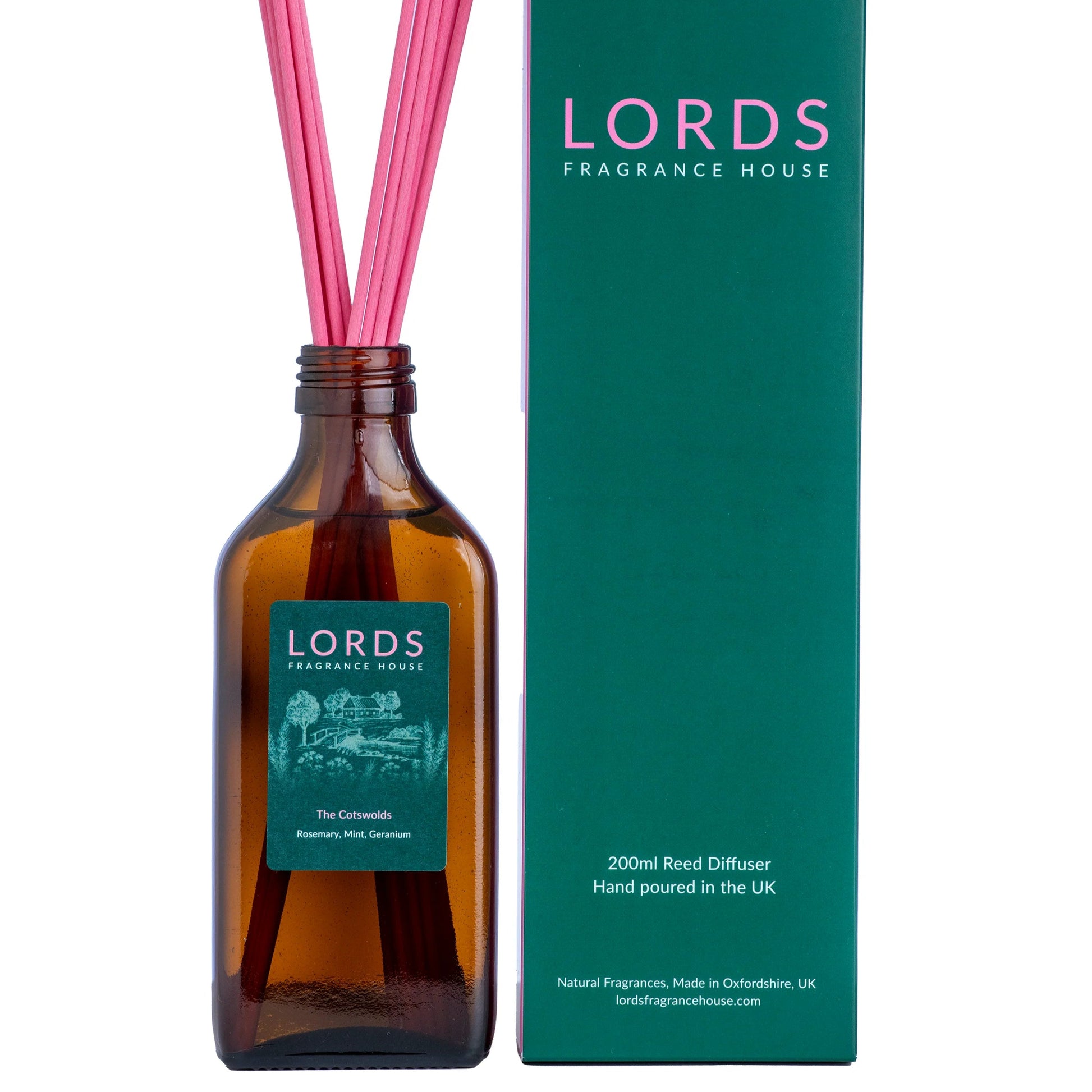 Lords fragrance diffuser bottle with pink reeds and packaging on a white background