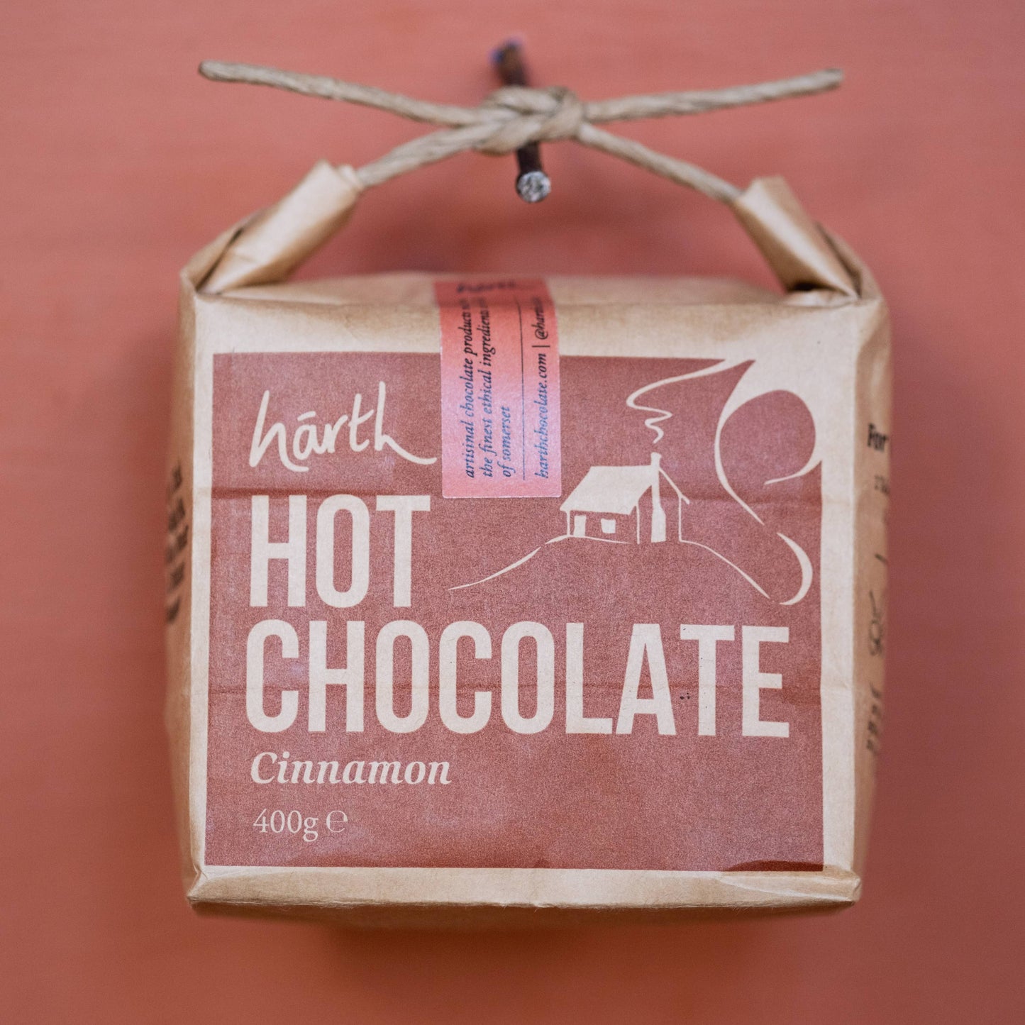 Box of Härth Cinnamon Hot Chocolate on a red background
