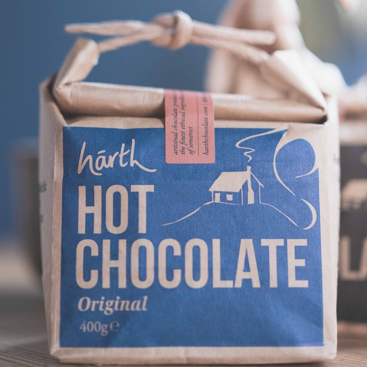 Box of Harth Hot Chocolate with a blue label on a blurred background