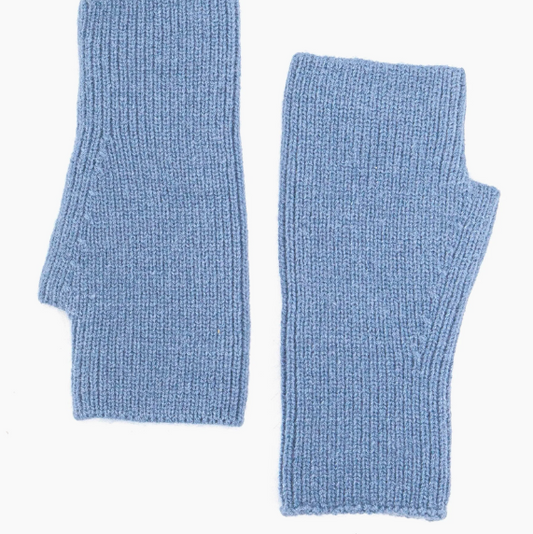 Pair of blue knitted arm warmers on a white background