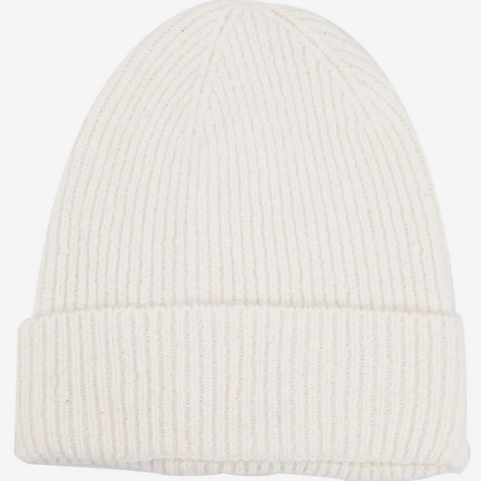 White knit beanie on a light gray background