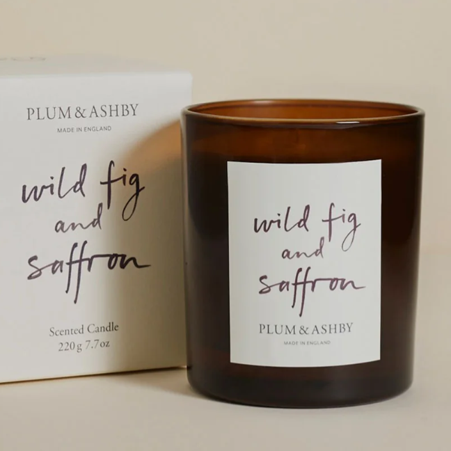 Plum & Ashby candle and packaging on a beige background