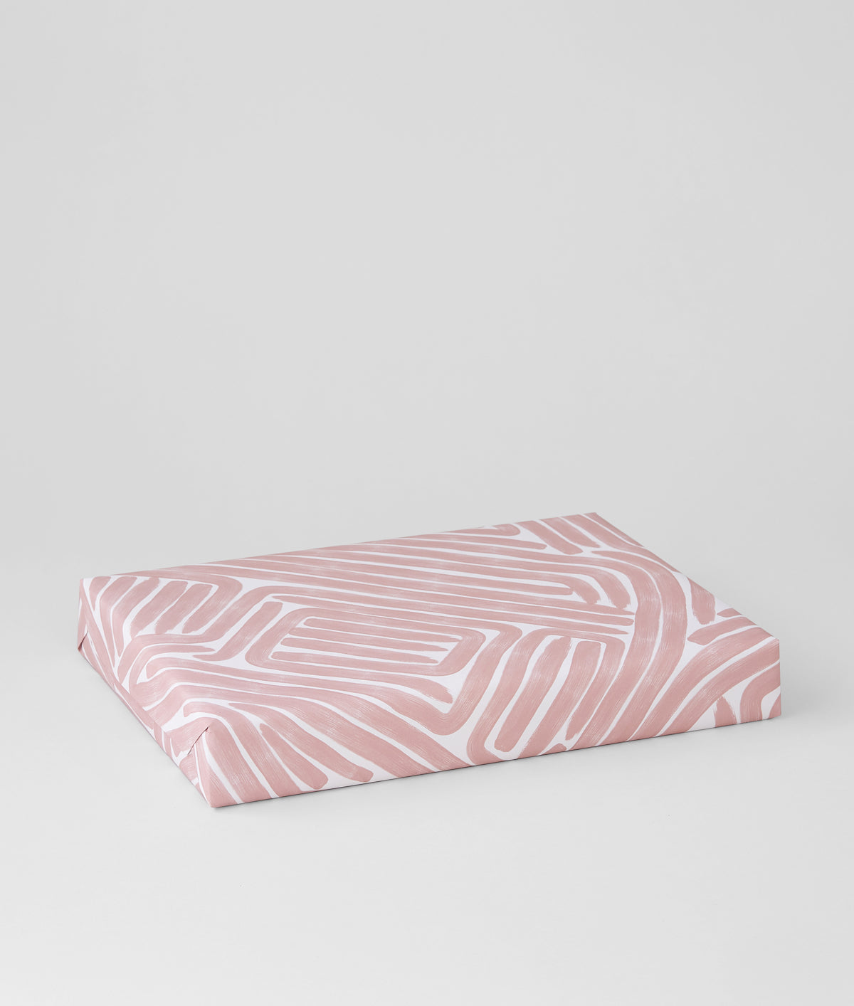 Muted pink maze wrapping paper
